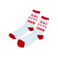 A pair of white crew socks with red heels, toes, and cuffs, featuring the red text 'CHI TOWN' and red stars printed on the sides, displayed on a clean white background.