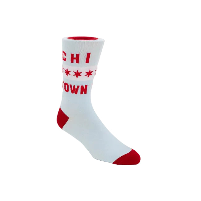 A single crew sock on a white background, featuring a light blue body with red accents on the toe, heel, and cuff, and red text and stars on the upper leg.