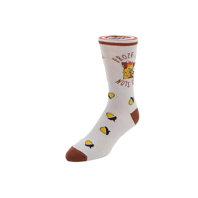 A single crew sock on a white background, featuring a light gray base with brown toe and heel caps, yellow and black nut illustrations, and a cartoon character graphic with the text 'FROZE MY NUTS OFF'.