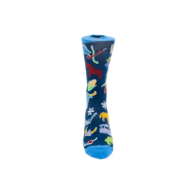 A single crew sock on a light gray background, featuring a dark blue base with colorful Minnesotan icons including a viking hat, a flag, a snowflake, hockey gear, a star, a snowflake and more. 