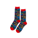 A pair of tall socks with a colorful retro pattern of 'OPE', 'HOT DISH', 'UFF DA', and 'YOU BETCHA' text on a white background.