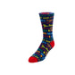 A single crew sock with a colorful all-over text pattern on a dark background, featuring a bright red toe and heel, photographed on a clean white studio background.