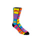 A single crew sock with a vibrant multicolor geometric pattern of yellow, pink, blue, purple, and orange blocks, featuring the text 'the BEAN' on the side, set against a plain white background.