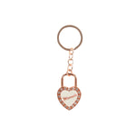 Rose gold heart-shaped padlock keychain with rhinestone trim and 'Minnesota' written on the padlock face, attached to a split key ring on a white background.
