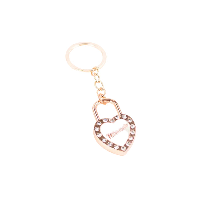 A rose gold heart-shaped padlock keychain with a rhinestone border and the name 'MINNESOTA' written in pink script on the padlock face, attached to a split key ring on a white background.
