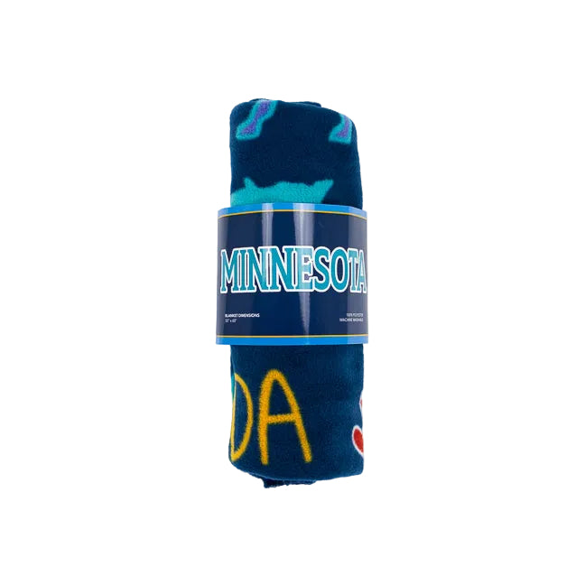 A rolled-up navy blue blanket featuring a Minnesota theme, including the word 'MINNESOTA' in white with a blue outline on the wrap, set against a plain white background.