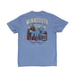 A heather blue short-sleeve t-shirt shown from the back, featuring a large graphic print of Paul Bunyan, Babe the Blue Ox, and the text 'MINNESOTA LEGENDS NEVER DIE' on a white background.