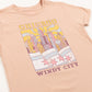 Dusty Rose-colored t-shirt with Chicago skyline graphic and 'Windy City' text on a white background