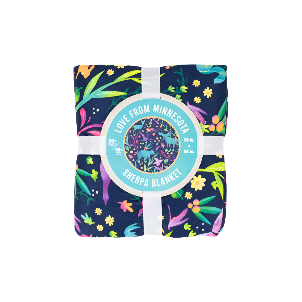 Colorful Sherpa blanket with floral pattern and 'Live from Minnesota' label on a white background