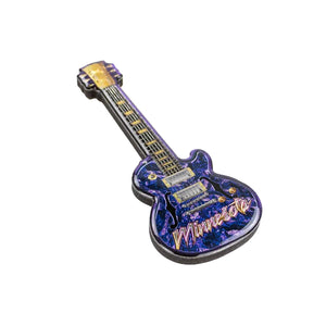 Guitar-shaped magnet with 'Minnesota' text on a white background