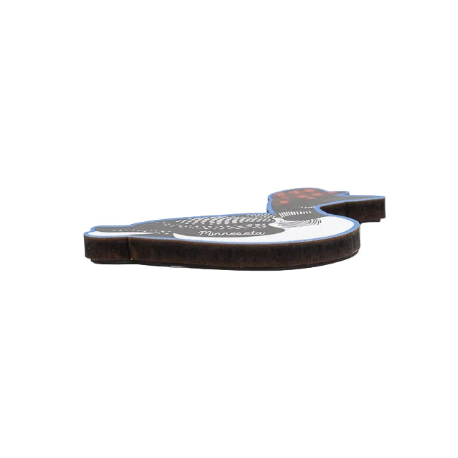 Side view of a loon bird-shaped magnet with a red and black checkered hat on a white background