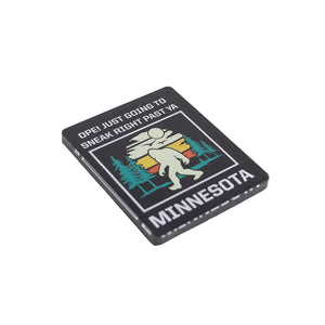 Magnet with a Bigfoot design and text on a white background