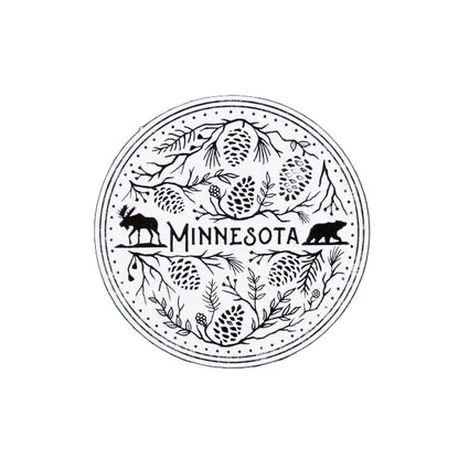 Round magnet with 'Minnesota' text and nature elements on a white background