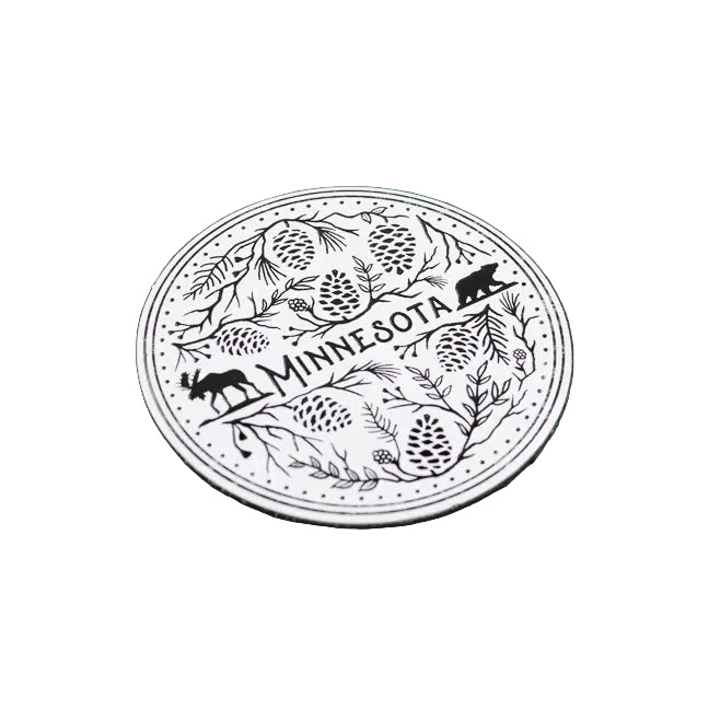 Round magnet with 'Minnesota' text and nature elements on a white background