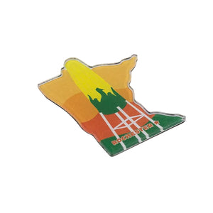 Fridge magnet shaped like the state of Minnesota with a colorful design, large ear of corn water tower, and 'Rochester' text on a white background.