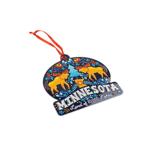 Decorative Minnesota ornament with moose and floral design on a white background