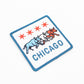 Embroidered patch with three bulls and stars, featuring the word 'Chicago'.