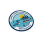 Round patch with a lake scene, loon, and pontoon, featuring text 'Lakes, Loons, & Pontoons Minnesota' on a white background.
