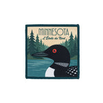 Patch with a loon and forest design, featuring the word 'Minnesota'.