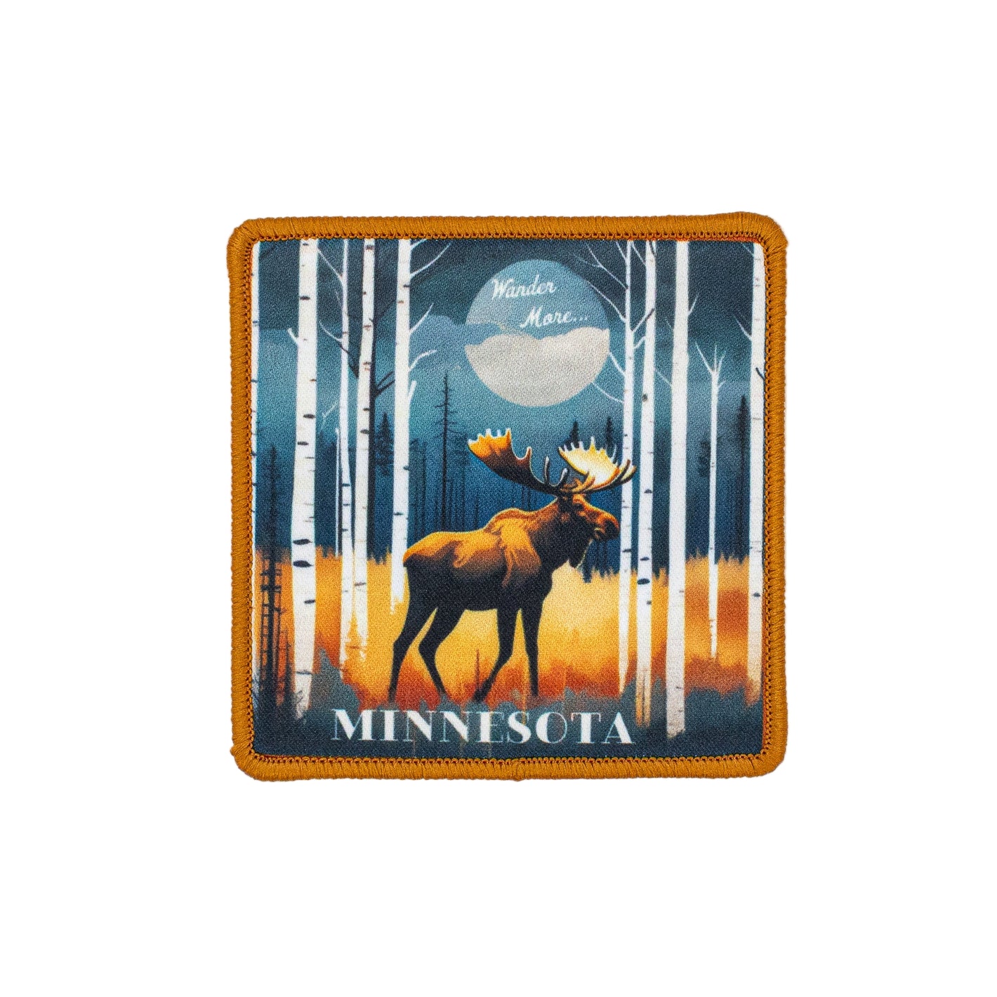 Patch with a moose in a forest design and 'Minnesota' and 'Wander More' text on a white background.