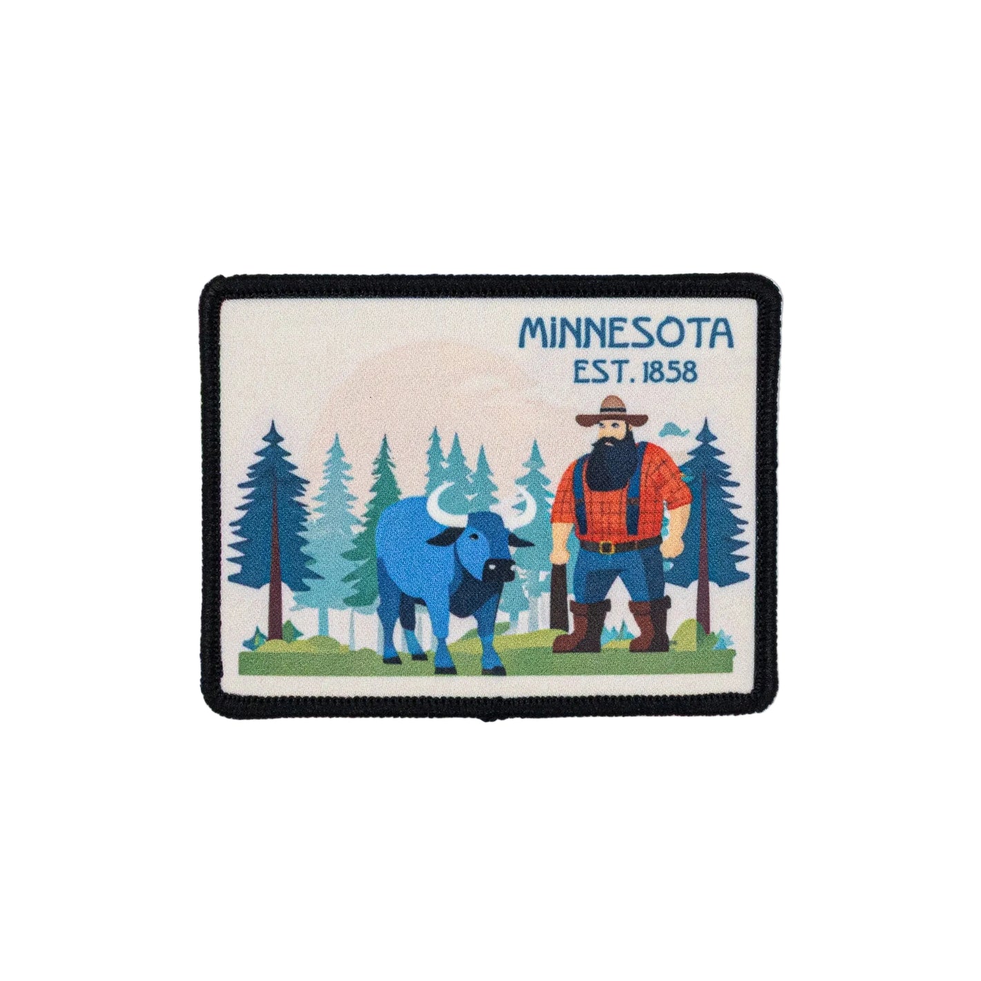 A patch featuring Paul Bunyan and Babe the Blue Ox set against a forest of pine trees. Text reads Minnesota, Est. 1858. The patch is set against a white background.