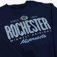 Navy blue sweatshirt with 'Rochester, Minnesota' text and graphics on a white background
