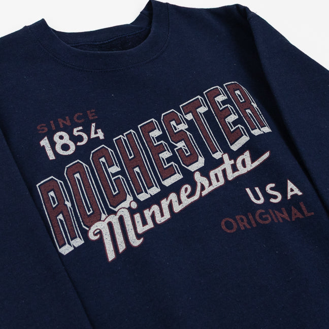 Navy blue sweatshirt with 'Rochester, Minnesota USA Original' text on a white background