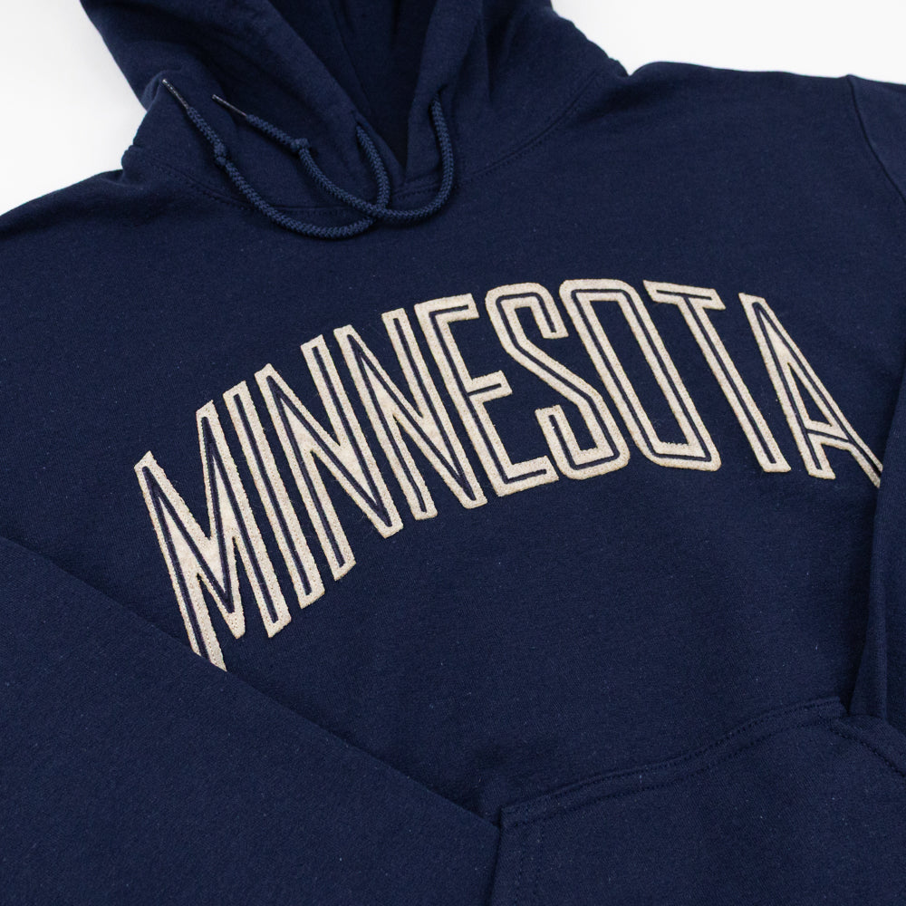 Navy blue hoodie with 'MINNESOTA' text on a white background