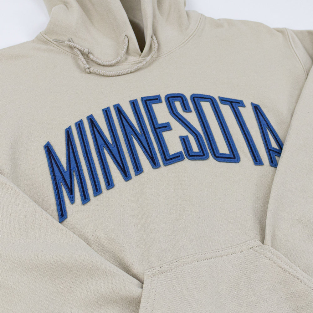 Beige hoodie with 'MINNESOTA' embroidered in blue on a white background