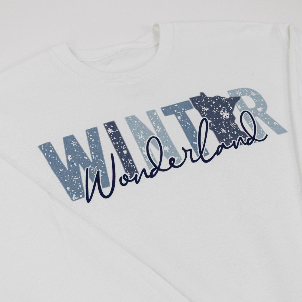 White sweatshirt with 'Winter Wonderland' text and snowflake design on a white background