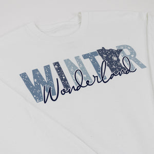 White sweatshirt with 'Winter Wonderland' text and snowflake design on a white background