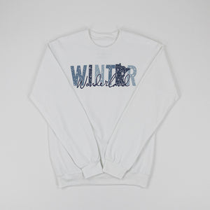 White sweatshirt with 'Winter Wonderland' text on a white background