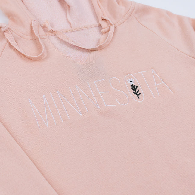 Blush Pink hoodie with 'MINNESOTA' text on a white background