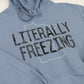 Blue hooded sweatshirt with a design of the shape of Minnesota and words "Literally Freezing" across the front. 