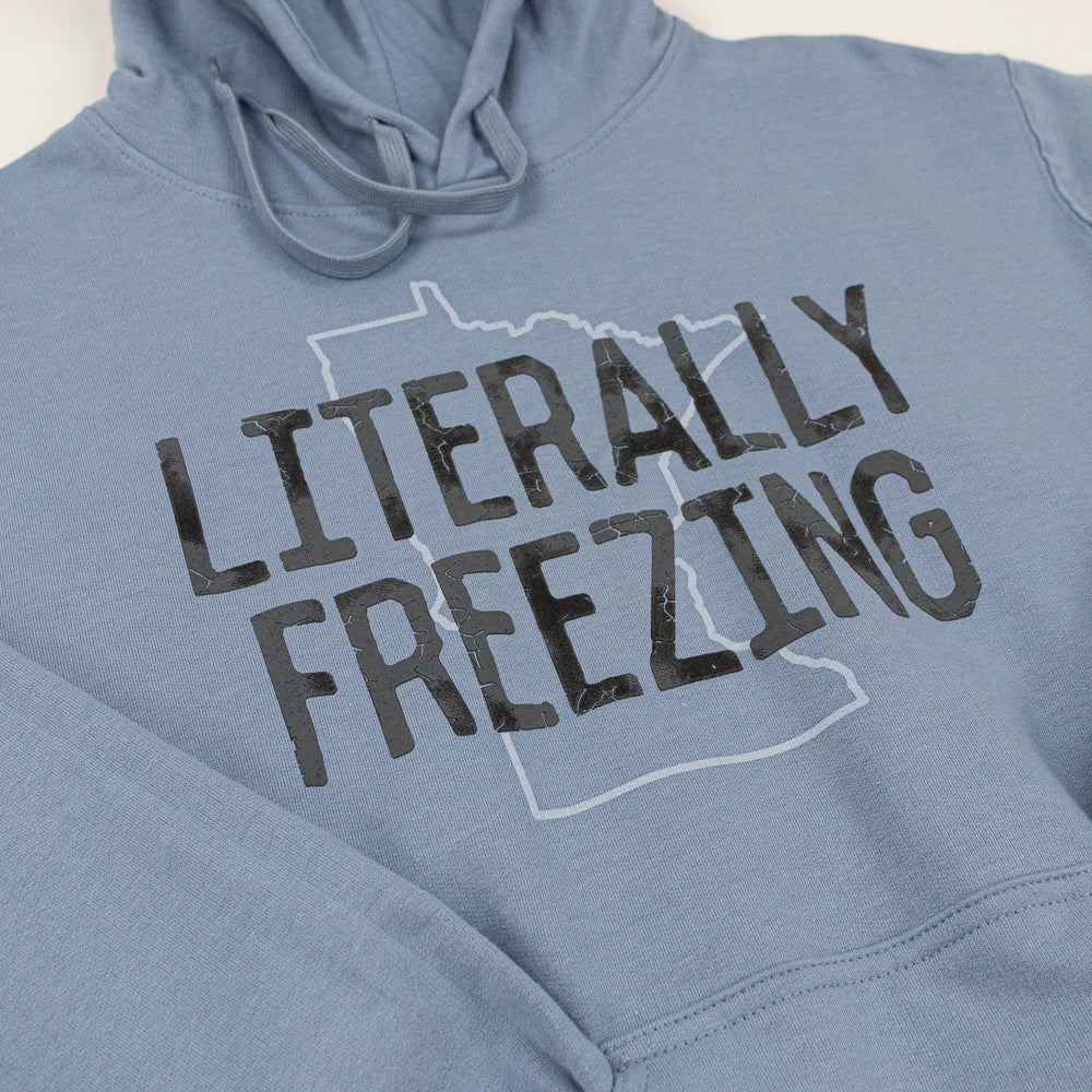 Blue hooded sweatshirt with a design of the shape of Minnesota and words "Literally Freezing" across the front. 
