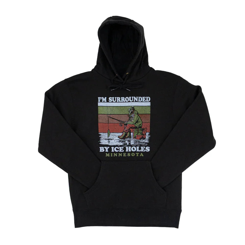 A black sweatshirt featuring a wintry ice fishing scene. Text reads "I'm surrounded by Ice Holes" and "Minnesota."