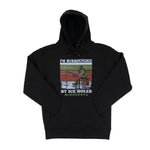 A black sweatshirt featuring a wintry ice fishing scene. Text reads "I'm surrounded by Ice Holes" and "Minnesota."