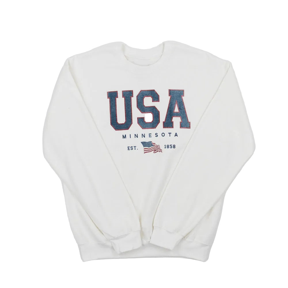 White sweatshirt that reads "USA Minnesota Est. 1858" in red and blue text with a waving American flag against a white background.