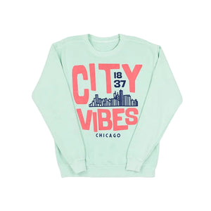 Mint Green sweatshirt with pink text 'CITY VIBES 1837 CHICAGO' and a city skyline design on a white background
