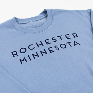 Light blue sweatshirt with 'Rochester Minnesota' text on a white background