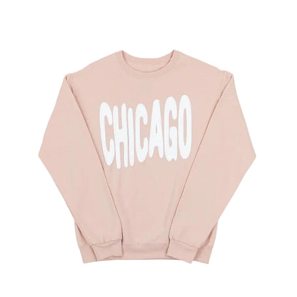 Blush Pink sweatshirt with 'CHICAGO' printed in white bouncy letters on a white background