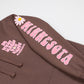 Brown hoodie with pink 'MINNESOTA' text and floral designs on a white background