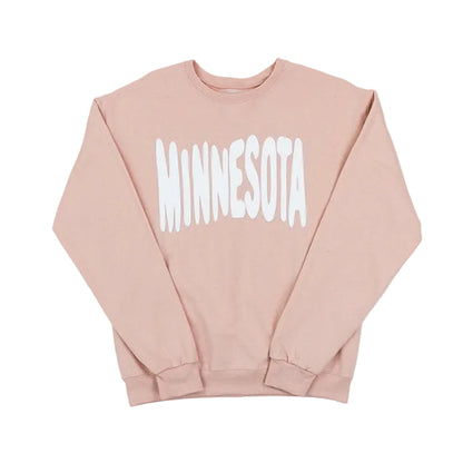 Pink sweatshirt with MINNESOTA spelled out across the front in white bouncy letters, set against a white background.