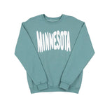 A turquoise sweatshirt with MINNESOTA spelled out in bouncy white letters across the front, set against a white background.