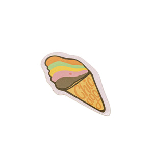 Sticker of a colorful ice cream cone with 'Chicago' text on a light pink background.