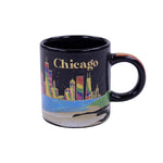 Black mug with Chicago skyline design and word Chicago on a white background