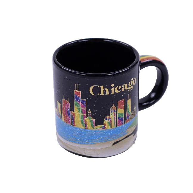 Black mug with colorful Chicago skyline design on a white background