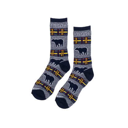 Plaid socks with bear design and 'Colorado' text on a white background