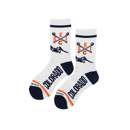 White socks with skiing designs and 'Colorado' text on a white background