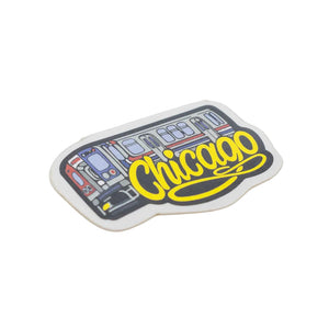 Sticker of Chicago's L-Train with the word Chicago in yellow set against a white backdrop.